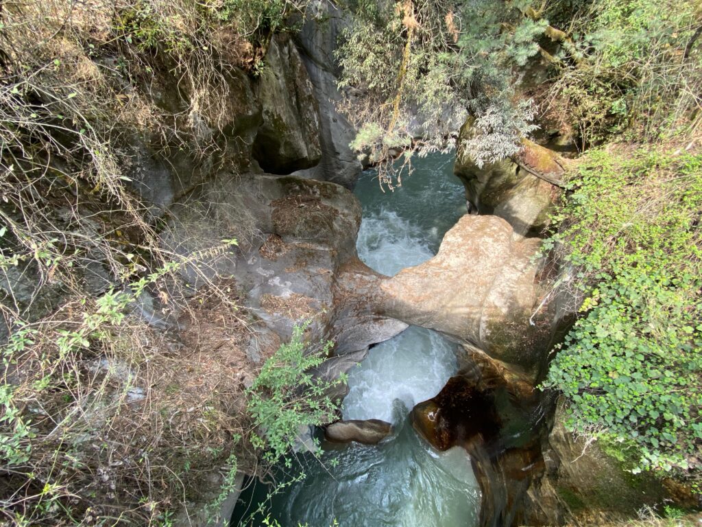 Water funneling through a rocks
