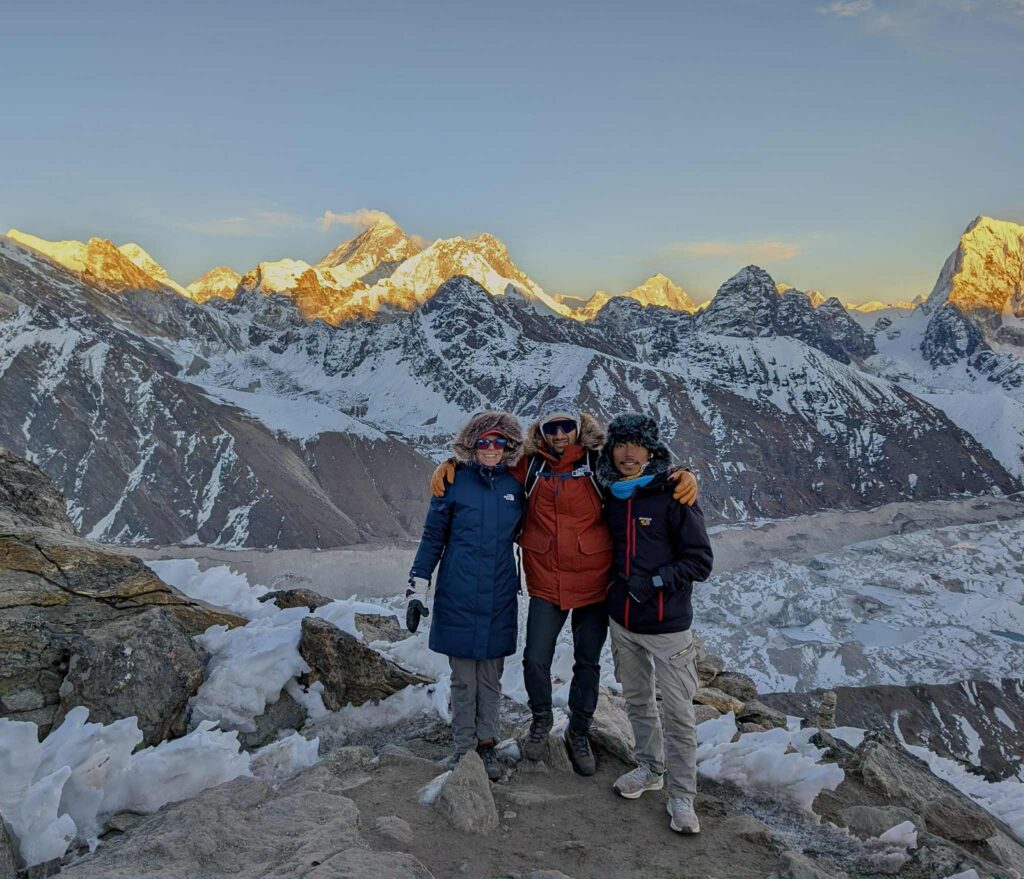 View of Gokyo Valley with turquoise lakes and surrounding Himalayan peaks.